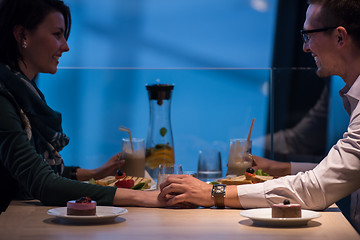 Image showing loving couple enjoying romantic dinner