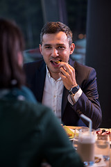 Image showing loving couple enjoying romantic dinner