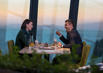 Image showing loving couple enjoying romantic dinner