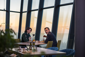 Image showing loving couple enjoying romantic dinner