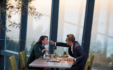 Image showing loving couple enjoying romantic dinner