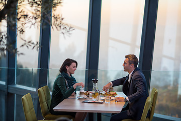 Image showing loving couple enjoying romantic dinner