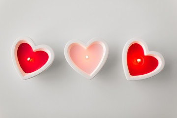 Image showing heart shaped candles burning on valentines day