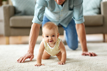 Image showing happy little baby girl with father at home