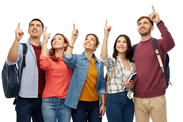 Image showing group of happy students pointing fingers up