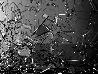 Image showing Pieces of glass shattered or cracked on black