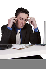 Image showing Businessman at His Desk Working