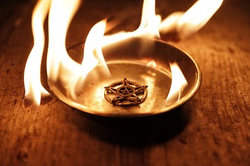 Image showing Old pentagram burning in flames