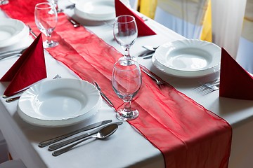 Image showing Large dining hall with tables set up