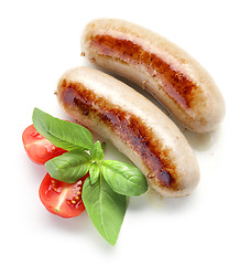 Image showing grilled sausages on white background