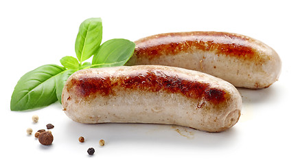 Image showing grilled sausages on white background