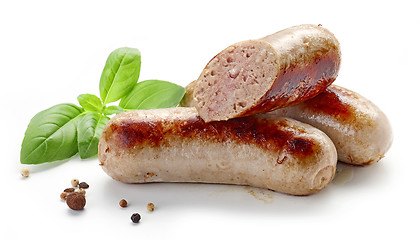 Image showing grilled sausages on white background