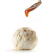 Image showing caramel sauce pouring on ice cream