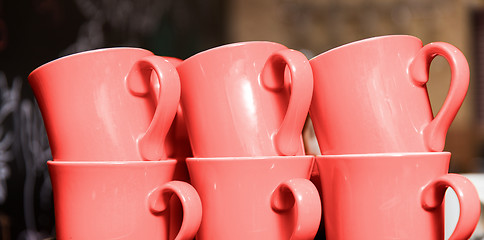 Image showing six stacked cups in trendy living coral color