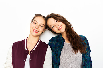 Image showing happy smiling teenage girls over white background