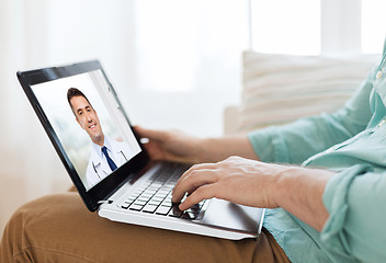 Image showing patient having video call with doctor on laptop