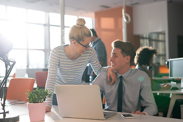 Image showing Two Business People Working With laptop in office