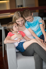 Image showing Young Family Using A Tablet To Make Future Plans