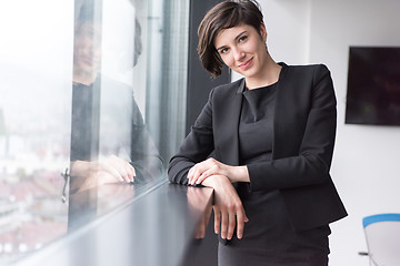Image showing Portrait of successful Businesswoman by the window