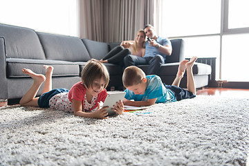 Image showing young couple spending time with kids