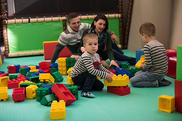 Image showing parents having fun with kids