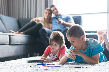 Image showing young couple spending time with kids