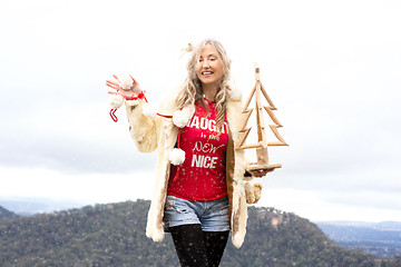 Image showing Cheeky Aussie girl celebrating Christmas in July Blue Mountains 