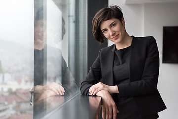 Image showing Portrait of successful Businesswoman by the window