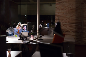 Image showing young designers in the night office