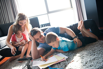 Image showing young couple spending time with kids