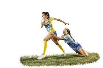 Image showing The young female rugby players isolated on white backround