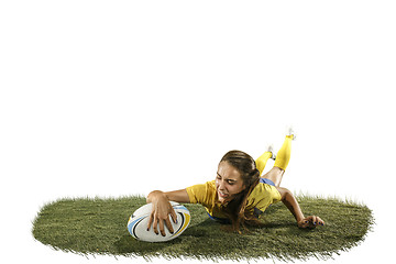 Image showing The young female rugby player isolated on white backround