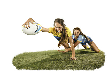 Image showing The young female rugby players isolated on white backround