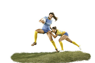 Image showing The young female rugby players isolated on white backround