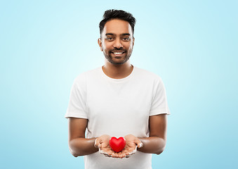 Image showing smiling indian man with red heart over grey