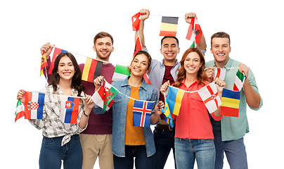 Image showing happy friends with flags of different countries