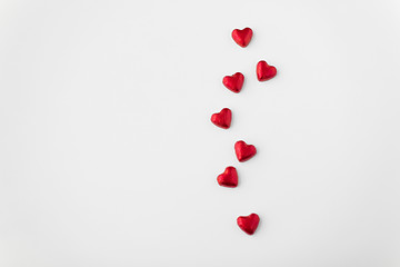 Image showing close up of red heart shaped chocolate candies