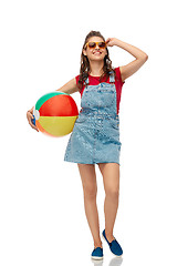 Image showing smiling teenage girl in sunglasses with beach ball