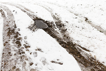 Image showing traces of the car on snow