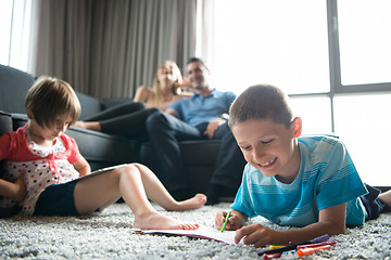 Image showing young couple spending time with kids