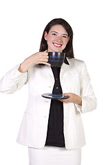 Image showing Woman Drinking Coffee Standing Up