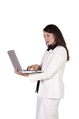 Image showing Beautiful Girl Holding a Laptop