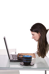 Image showing Businesswoman at Her Desk Working