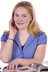 Image showing Beautiful Woman Reading a Magazine