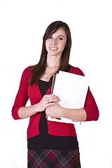 Image showing Cute Girl Holding Books and Magazine