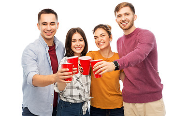 Image showing group of smiling friends with drinks in party cups