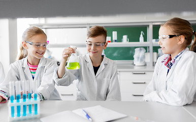 Image showing kids with test tubes studying chemistry at school