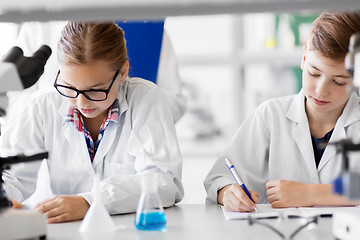 Image showing kids studying chemistry at school laboratory