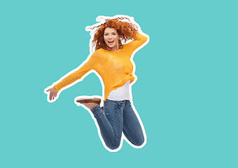 Image showing smiling young woman jumping in air