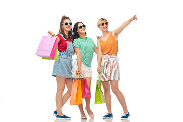 Image showing happy female friends with shopping bags